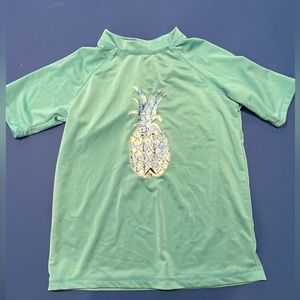 Kanu Surf Girls' UPF 50+ Sun Protective Rashguard. Pineapple Graphic. Size 10.